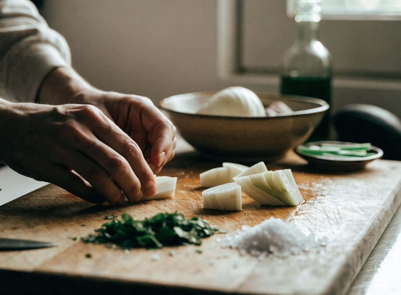 Chopping fresh vegetables on a wooden board